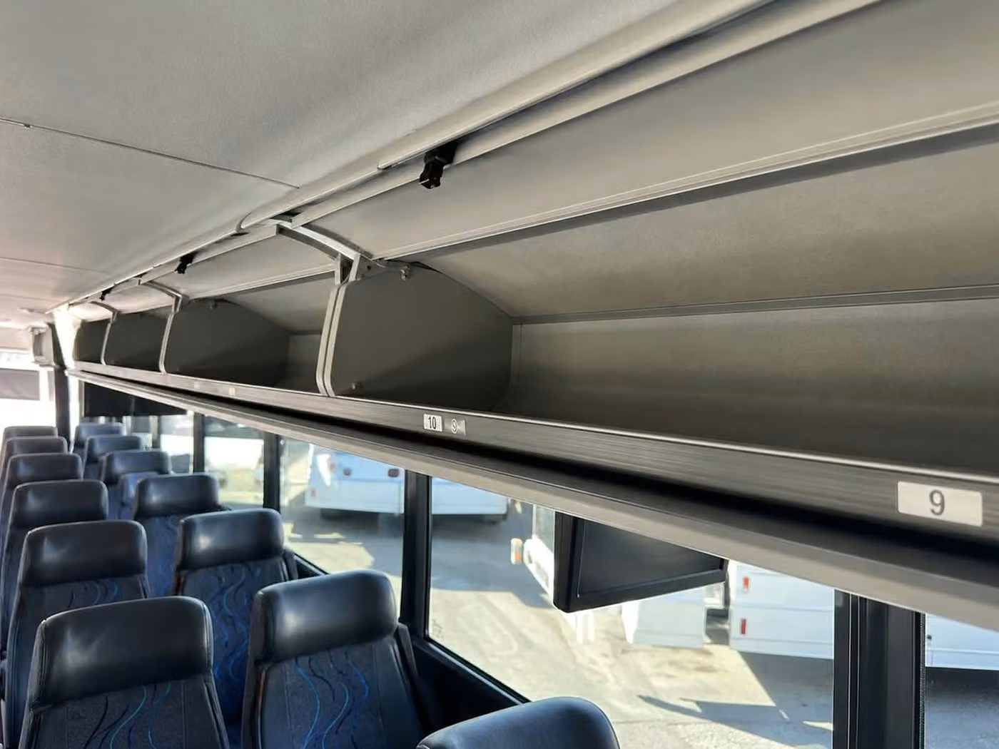 woodstock 18 passenger minibus overhead storage