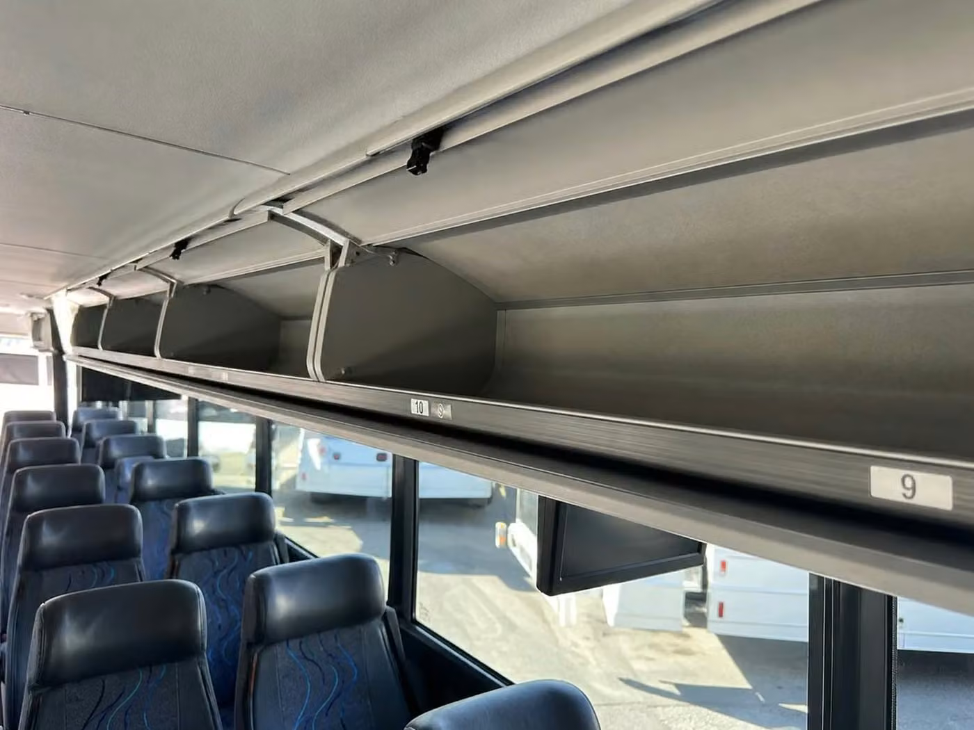 woodstock 25 passenger minibus overhead storage