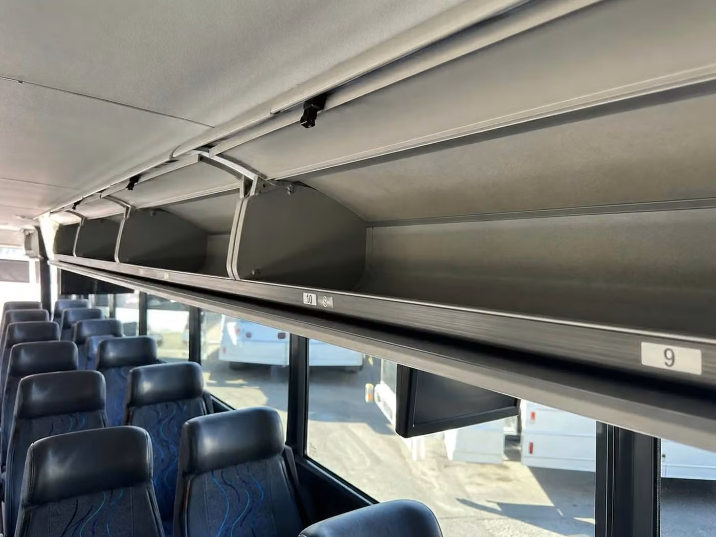 woodstock 28 passenger minibus overhead storage