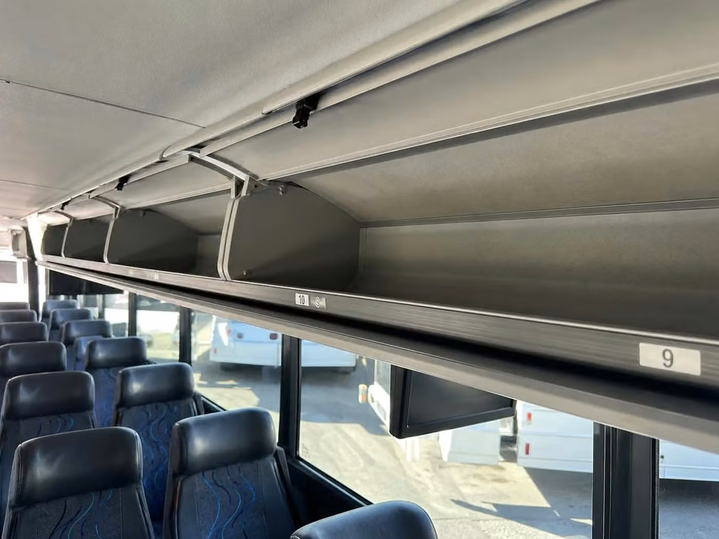 woodstock 35 passenger minibus overhead storage