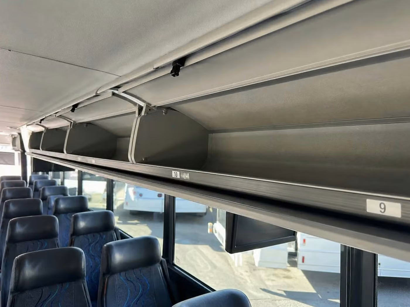 woodstock 56 passenger charter bus overhead storage