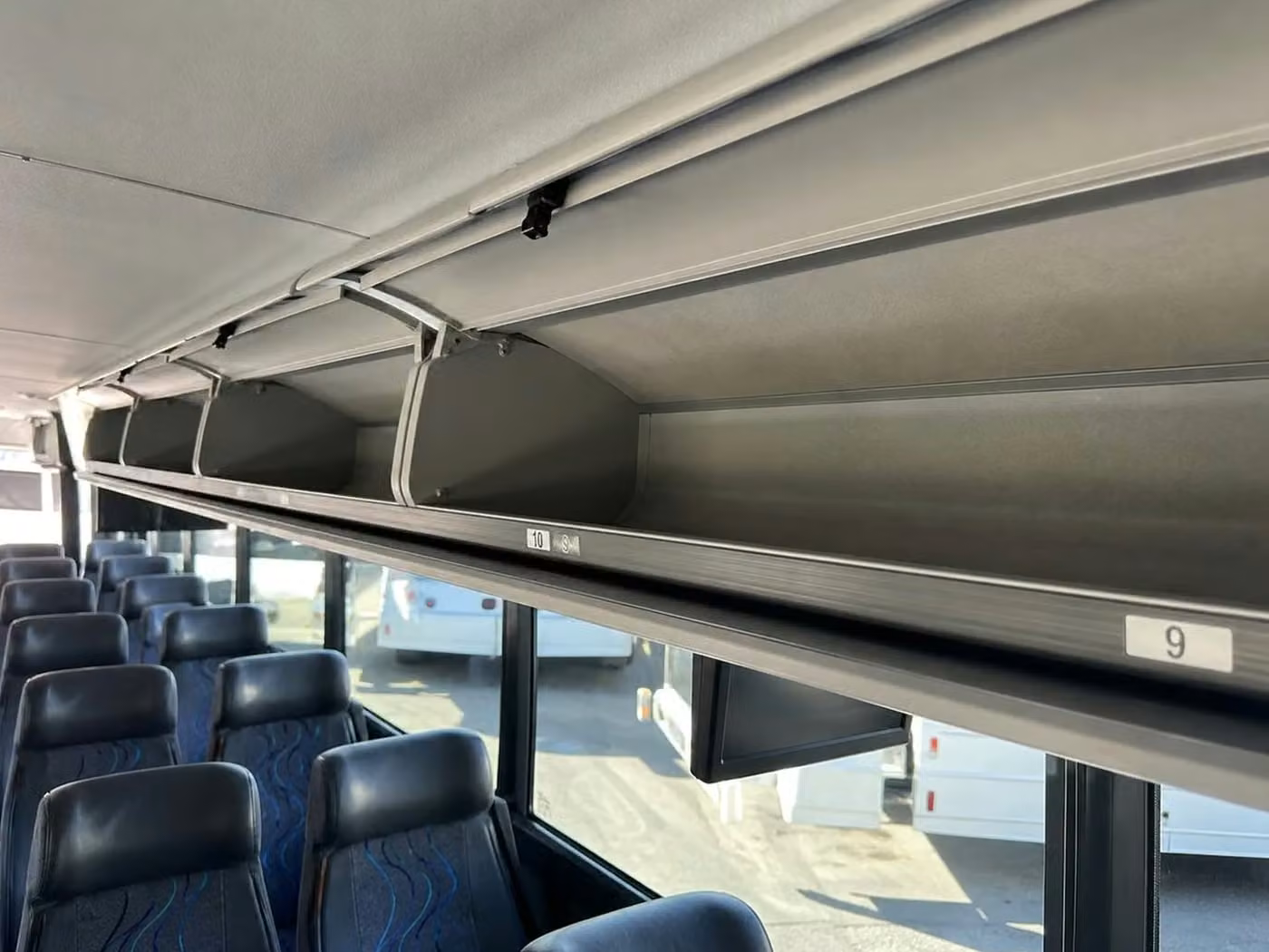 woodstock charter bus overhead storage